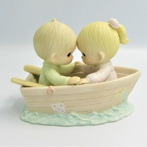 Precious moments “Friends Never Drift Apart” figurine.